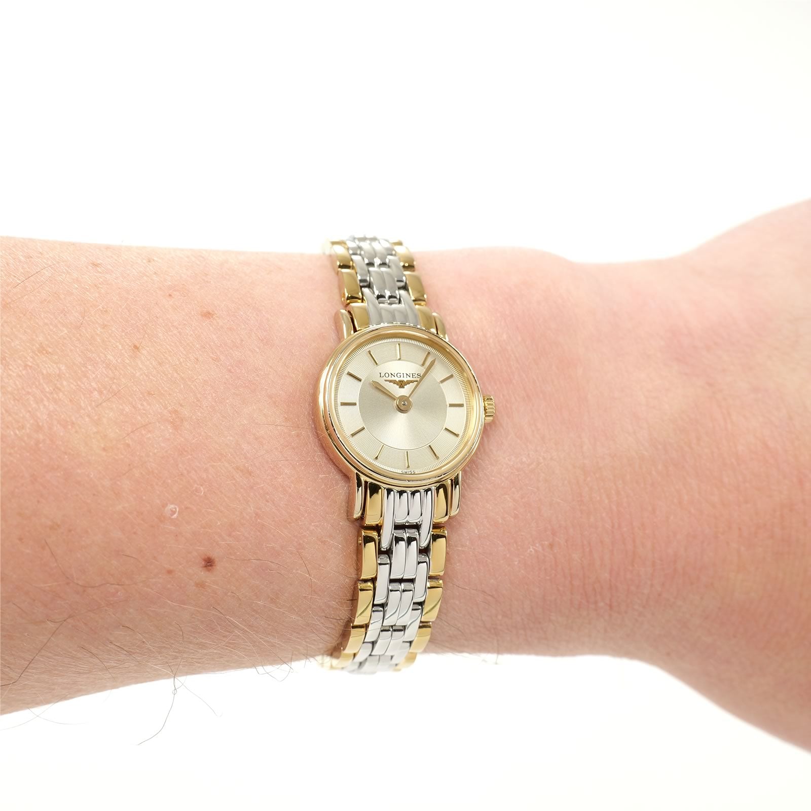 Longines Présence L4.219.2 Ladies Champagne Dial Two Tone watch on the wrist