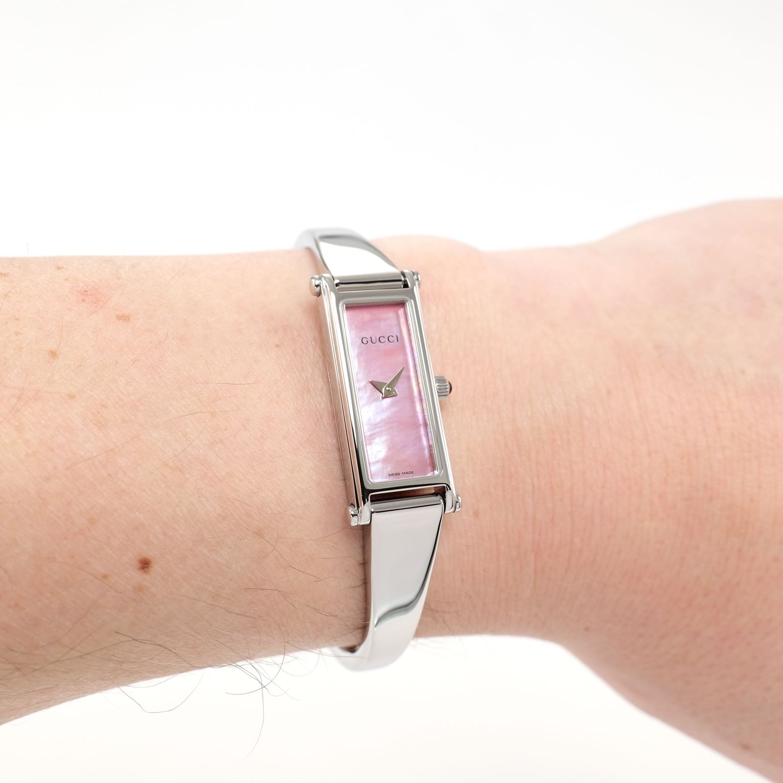 Gucci 1500L Pink Mother of Pearl Bangle Watch on the wrist