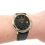 Raymond Weil Geneve 9155 Black Dial 18k Gold Plated men's watch on the wrist
