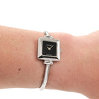Gucci 1900L Ladies Black Dial Square Bangle Watch on the wrist