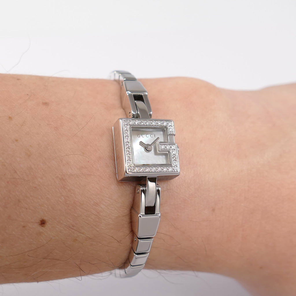 Gucci Mini G 102 White Mother of Pearl on the wrist