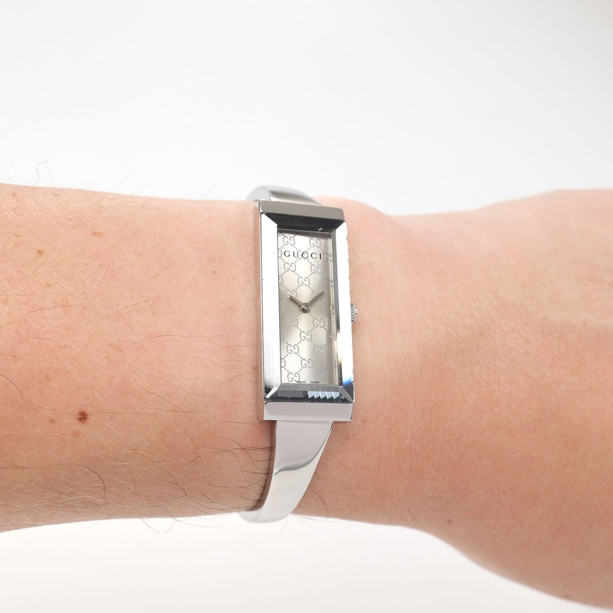Gucci G-Frame YA127511 Ladies Silver Dial Rectangular watch on the wrist