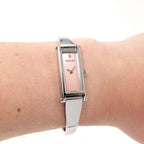 Gucci 1500L Pink Mother of Pearl Bangle watch on the wrist