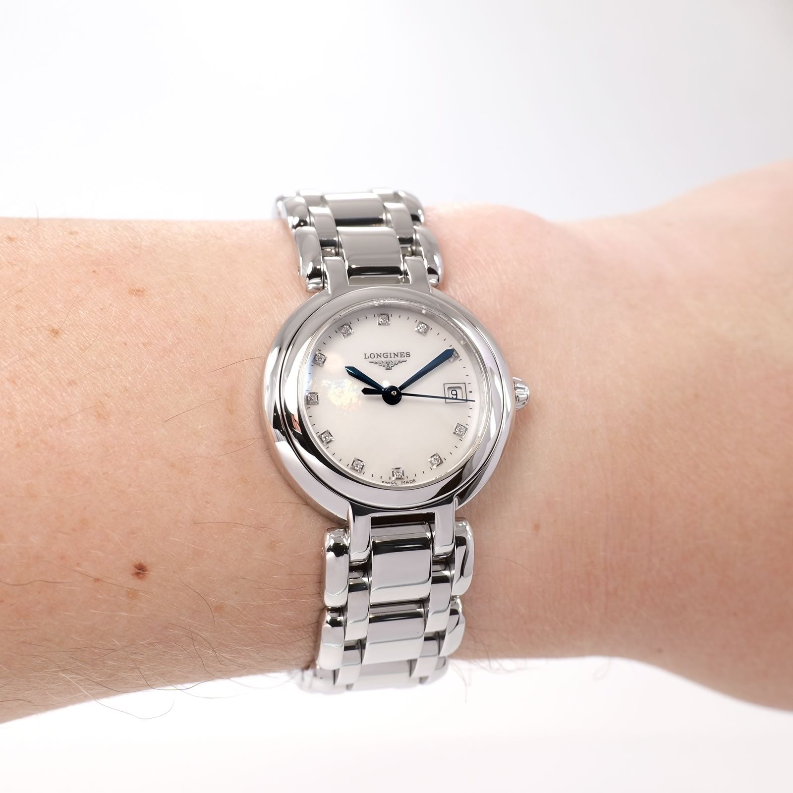 Longines PrimaLuna L8.110.4 Ladies White Mother of Pearl watch on the wrist