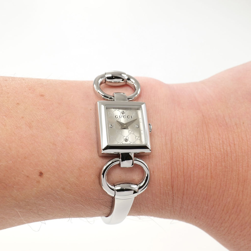Gucci Tornabuoni 120 Ladies  Silver Sunburst Dial with 4 Diamonds on the wrist