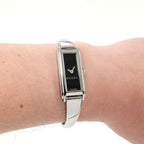 Gucci G-Line 109 Black Dial Bangle Watch on the wrist