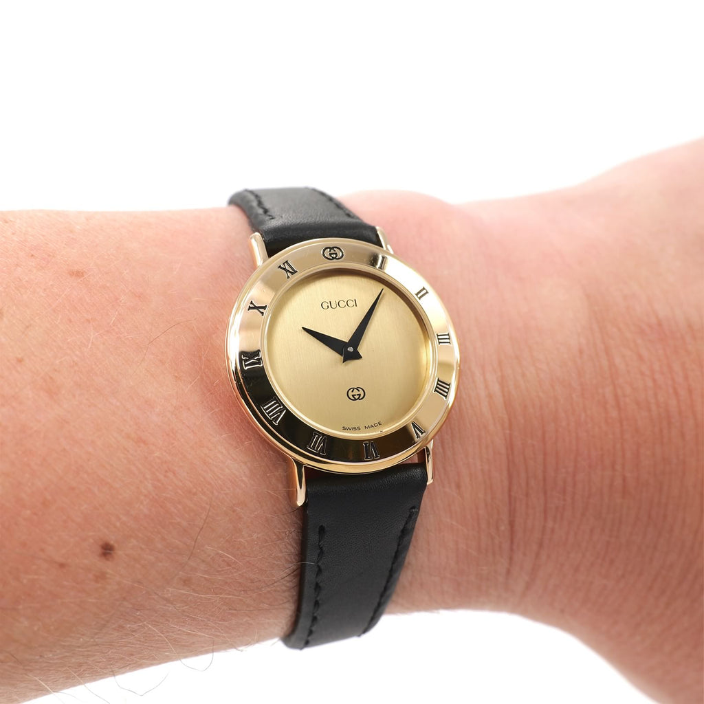 Gucci 3000L Ladies Champagne Dial 18k Gold Plated watch on the wrist