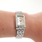 Raymond Weil Tango 5971 Ladie White Mother of Pearl rectangular watch on the wrist