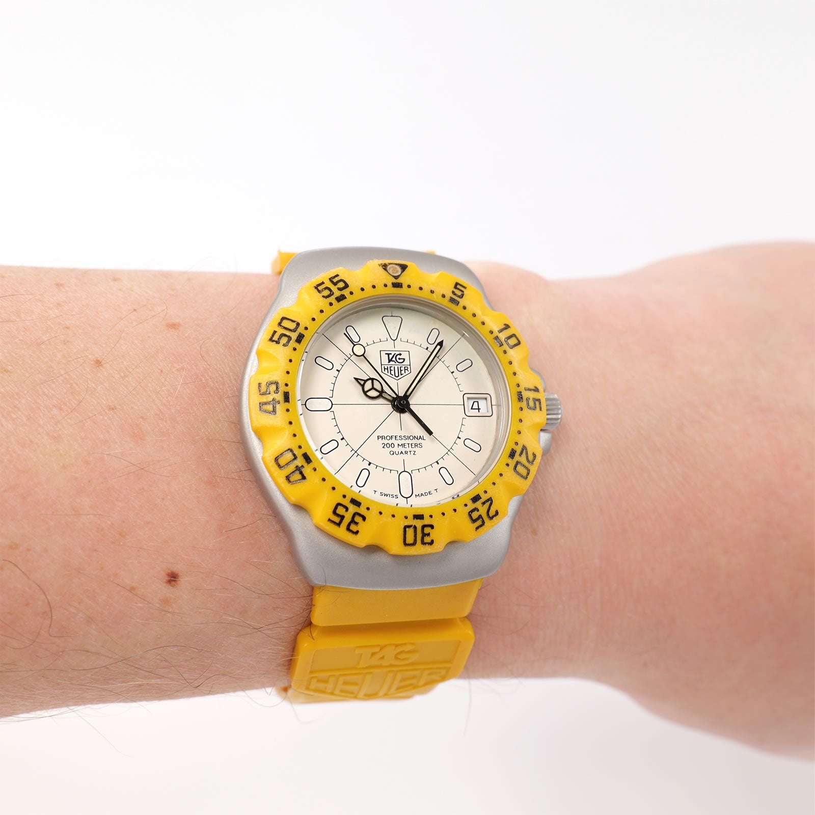 TAG Heuer Formula 1 Custom Cream Dial Yellow bezel on the wrist