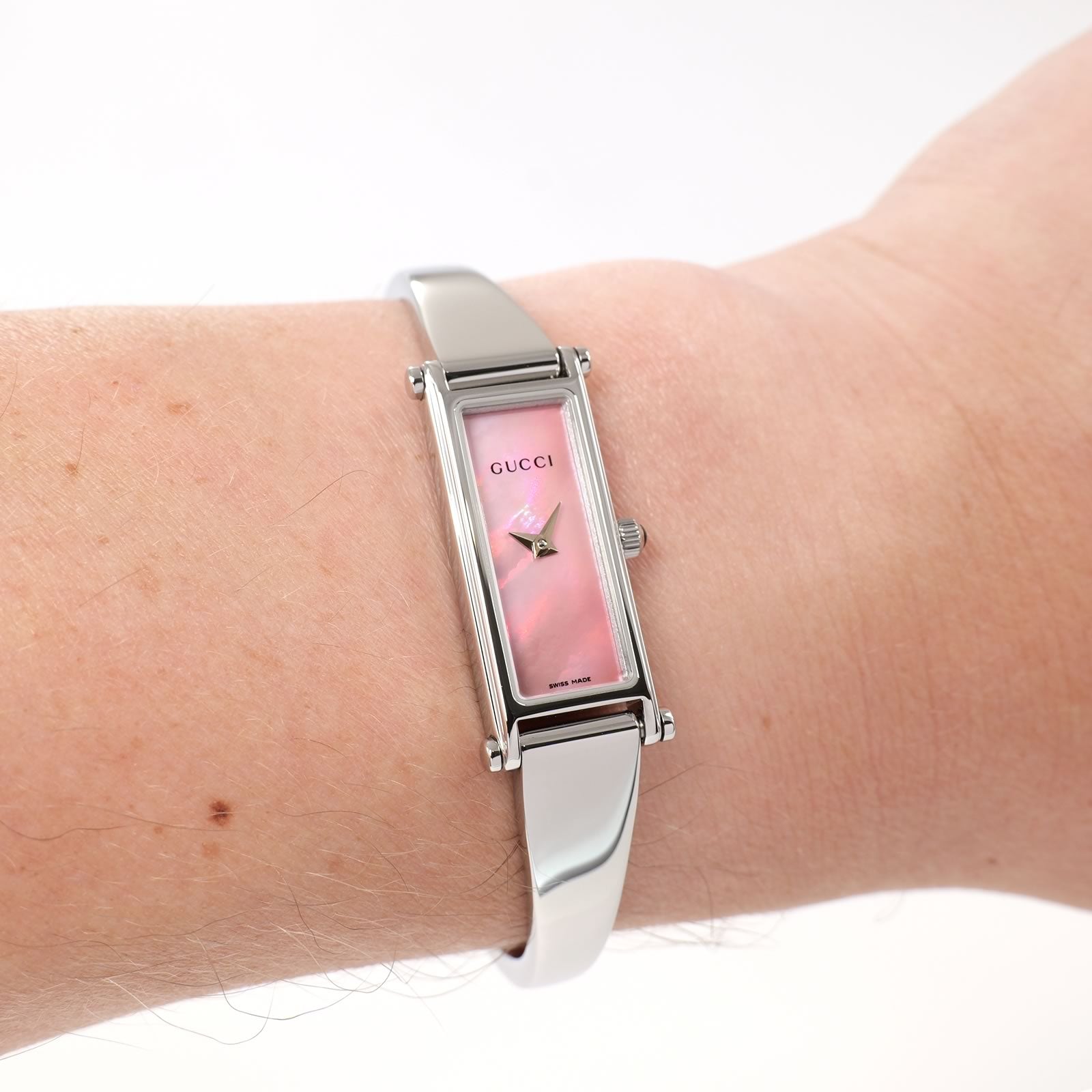 Gucci 1500L Ladies Pink Mother of Pearl Rectangular Watch on the wrist