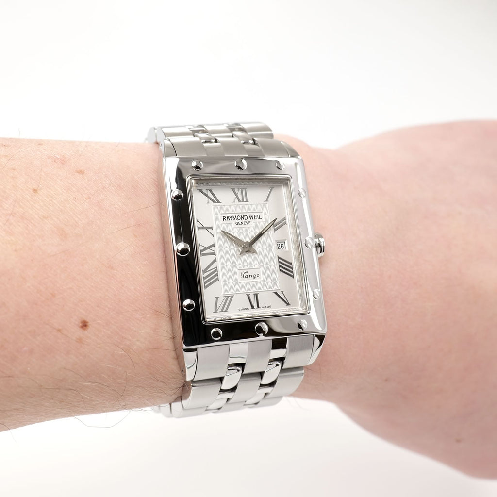Raymond Weil Tango 5381 Men's Silver Roman Numeral watch on the wrist