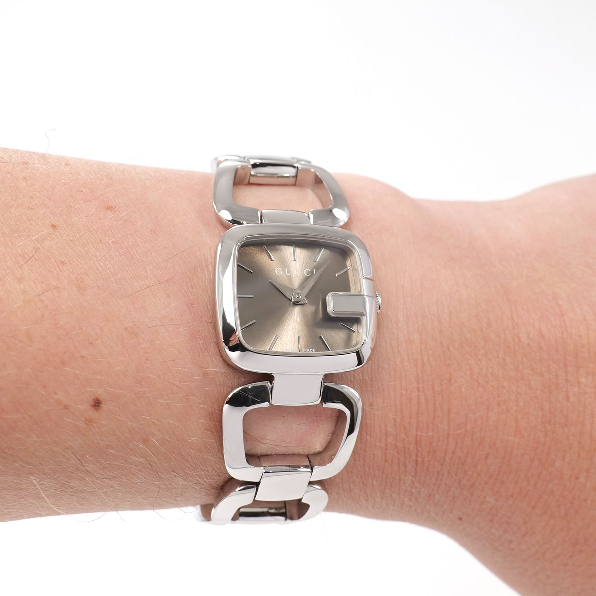 Gucci G 125.5 Ladies Brown square watch on the wrist