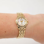 Raymond Weil Tango 5860 White Mother of Pearl 18k Gold Plated on the wrist