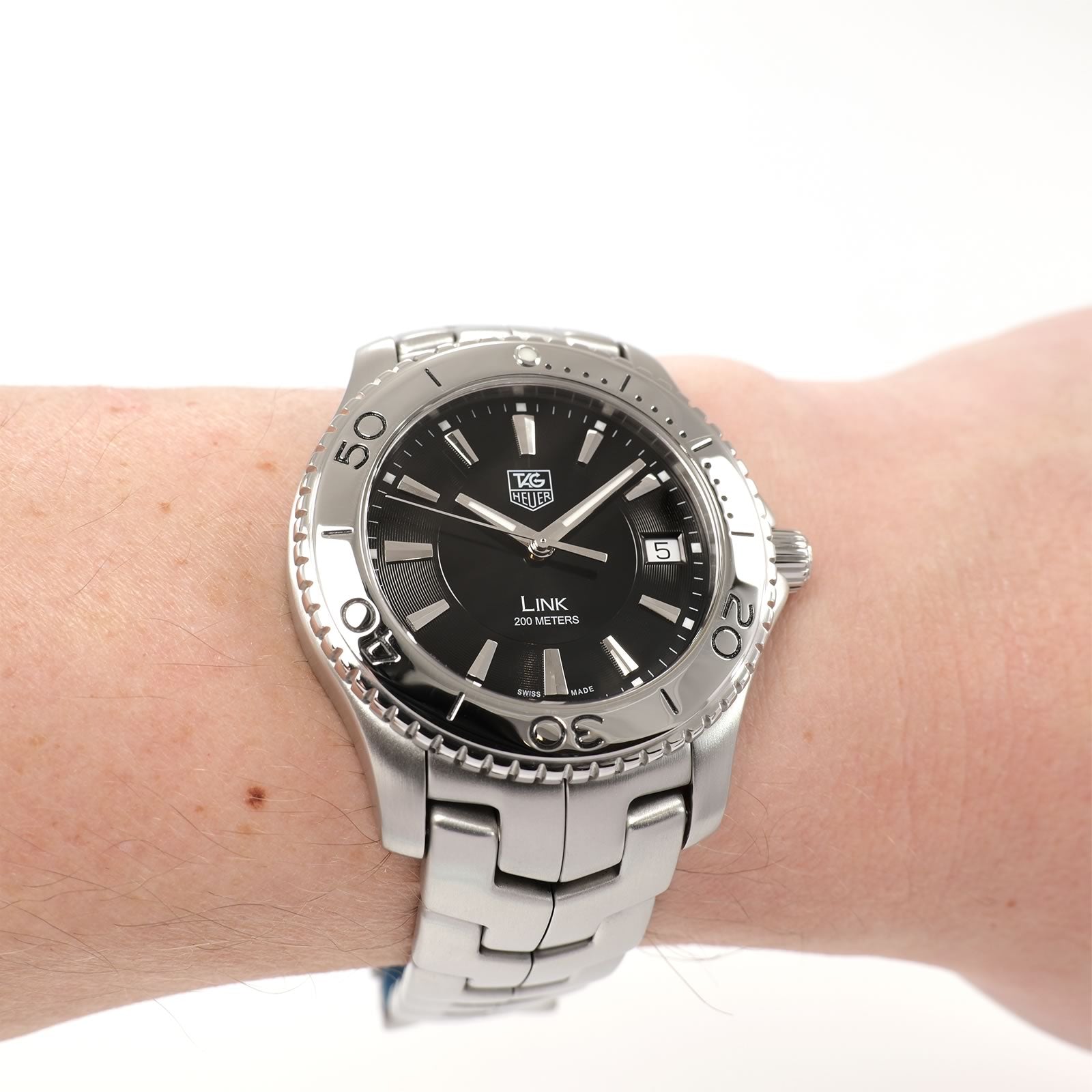 TAG Heuer Link WJ1110-0 Black Dial watch on the wrist