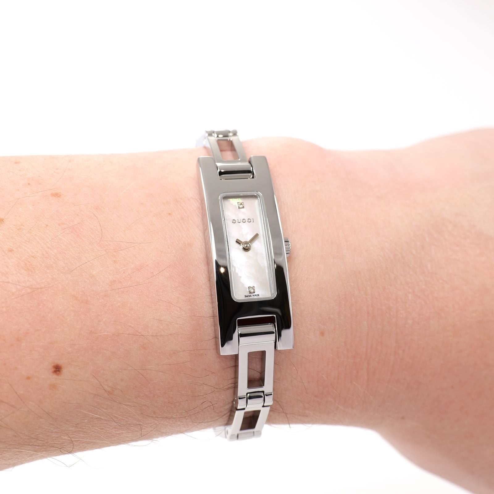 Gucci 3900L White Mother of Pearl Rectangular watch on the wrist