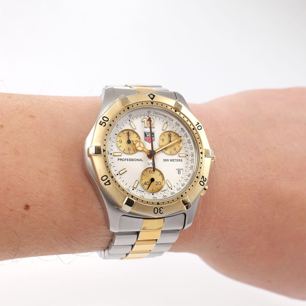 TAG Heuer 2000 Chronograph CK1121 Men's White dial two tone watch on the wrist