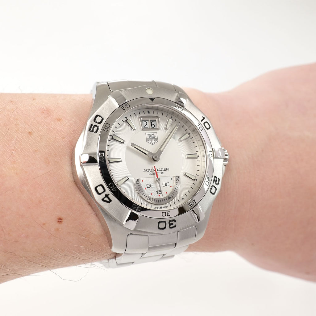 TAG Heuer Aquaracer WAF1011 Men's Silver Dial Grande Date watch on the wrist