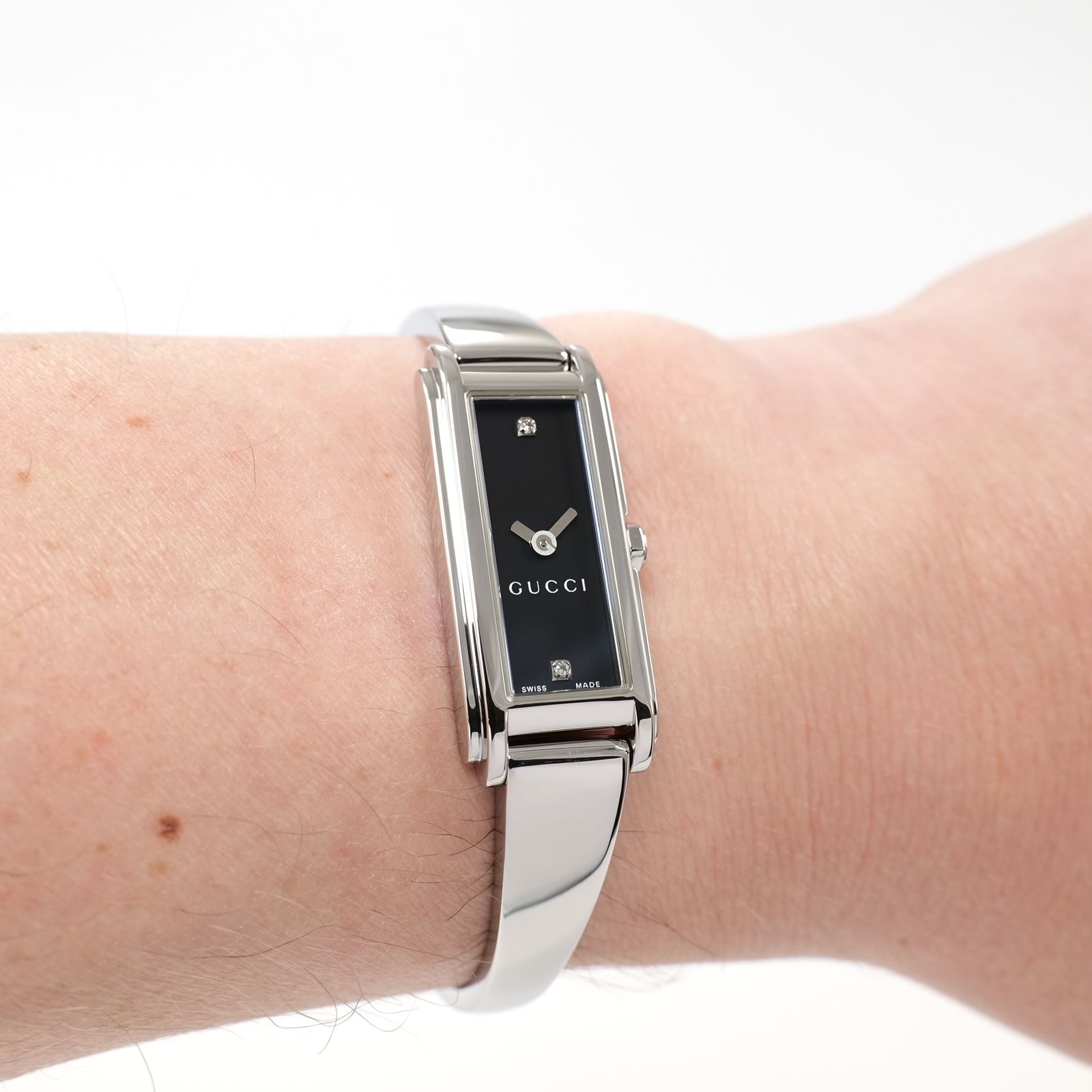 Gucci G-Line 109 Black Rectangular dial bangle ladies watch on the wrist