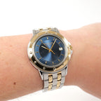Raymond Weil Tango 5560 Blue Sunburst Dial 18k Gold Plated bezel on the wrist
