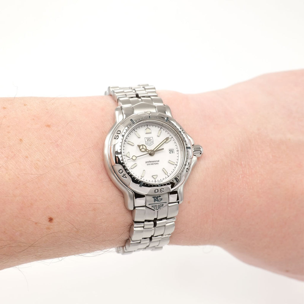 TAG Heuer 6000 WH1311-K1 White Dial watch on the wrist