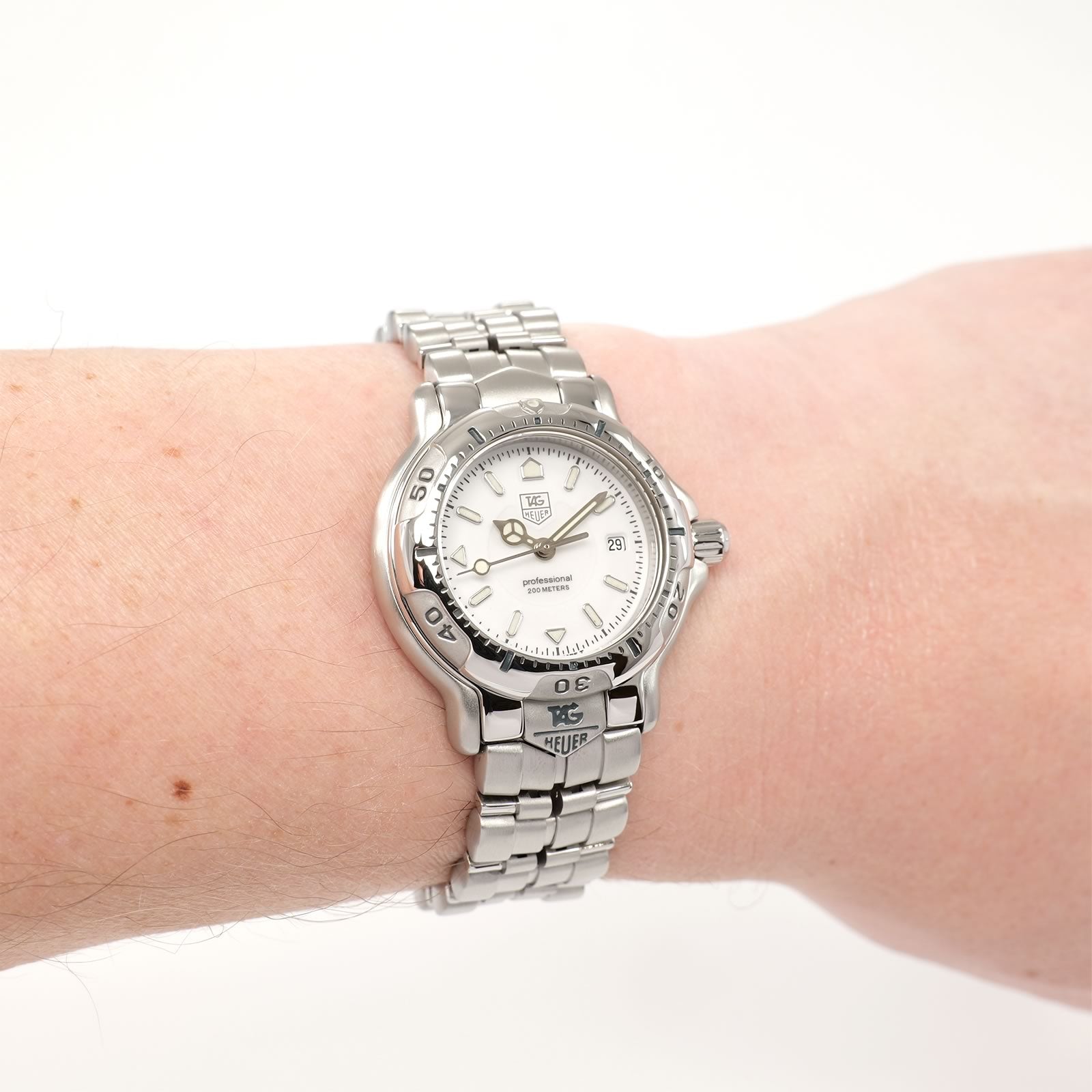 TAG Heuer 6000 WH1311-K1 White Dial watch on the wrist