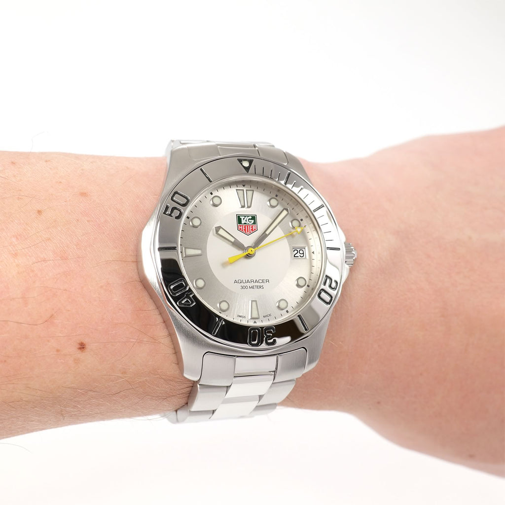 TAG Heuer Aquaracer WAB1111 Men's Silver dial watch on the wrist