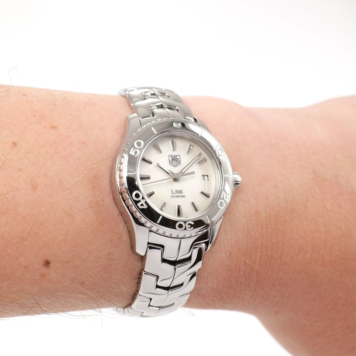 TAG Heuer Link WJ1313-0 Ladies White Mother of Pearl Dial watch on the wrist