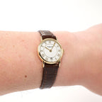 Raymond Weil Geneve 9923 Ladies White Dial 18k Gold Plated watch on the wrist