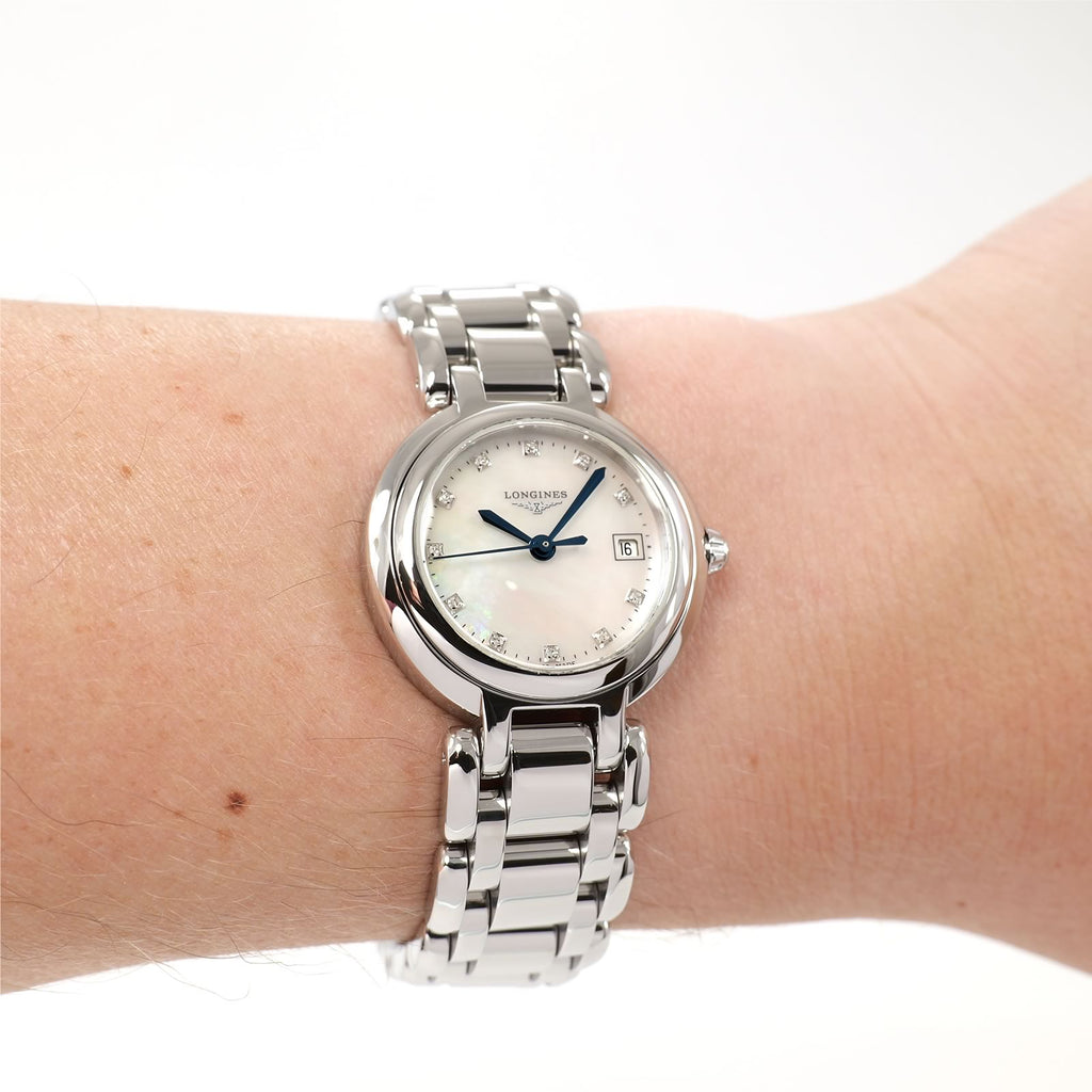 Longines PrimaLuna L8.110.4 Ladies White Mother of Pearl dial watch on the wrist