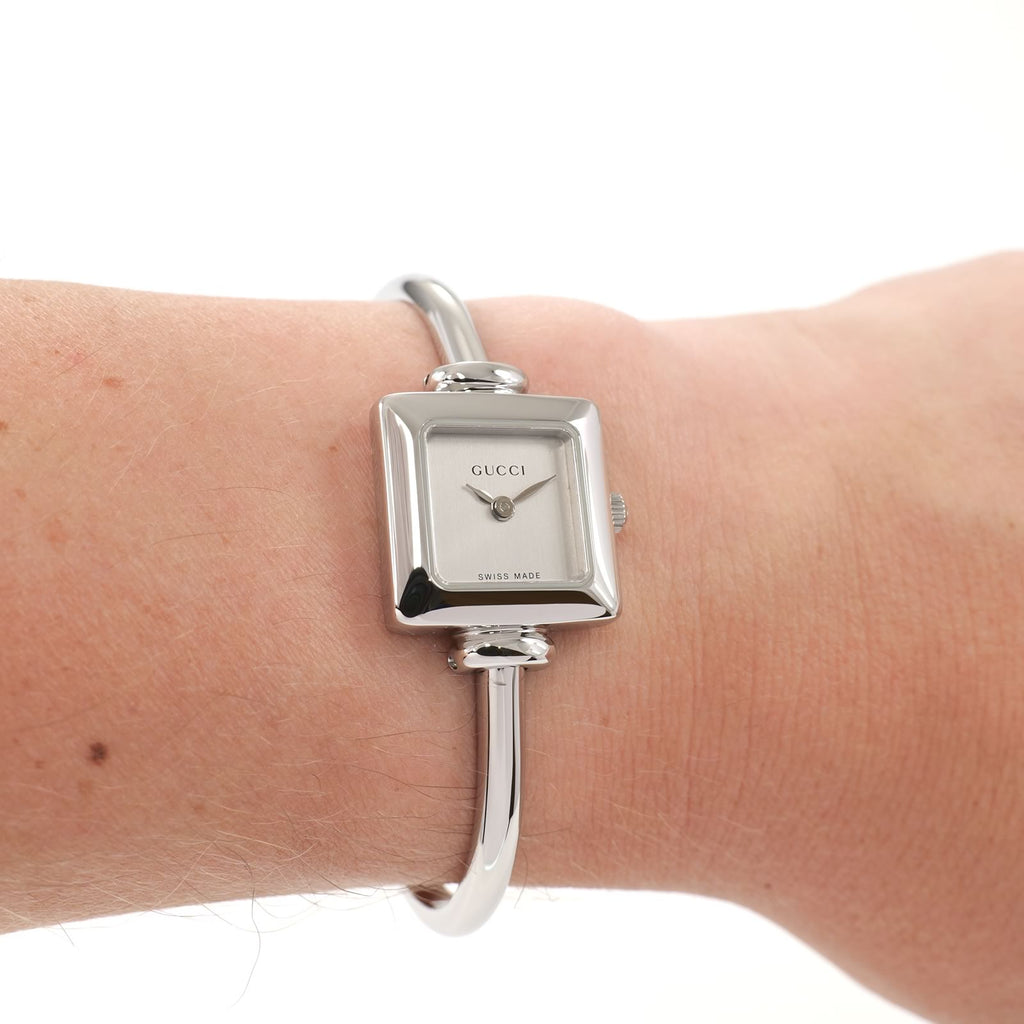 Gucci 1900L Ladies Silver Dial Square Bangle watch on the wrist