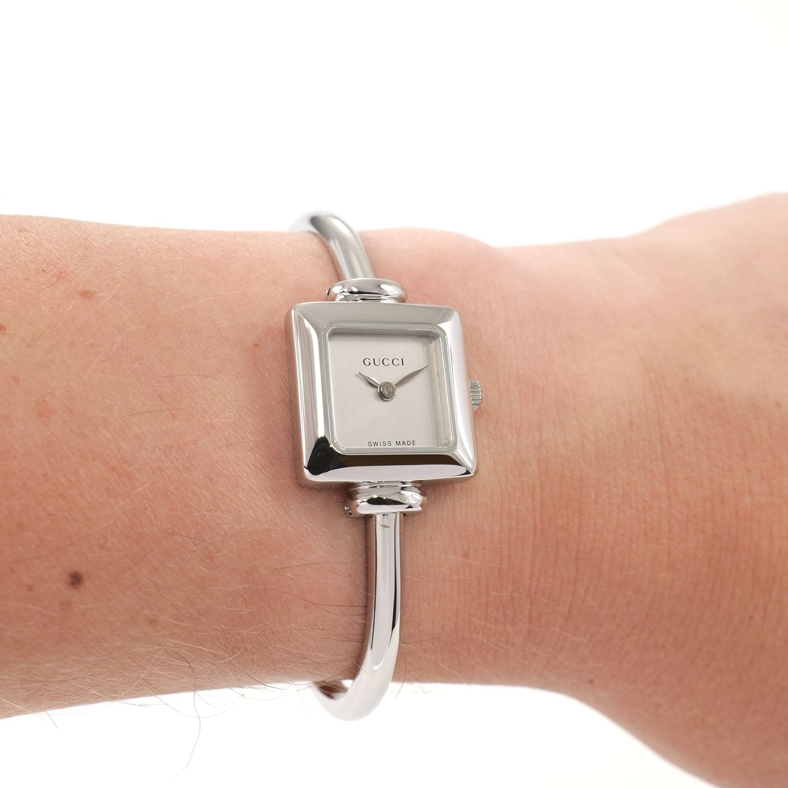 Gucci 1900L Ladies Silver Dial Square Bangle watch on the wrist