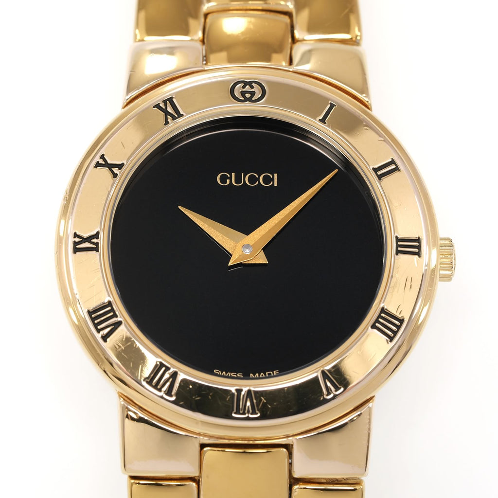 Gucci 3300L Black Dial 18k Gold Plated Roman Numeral bezel close up