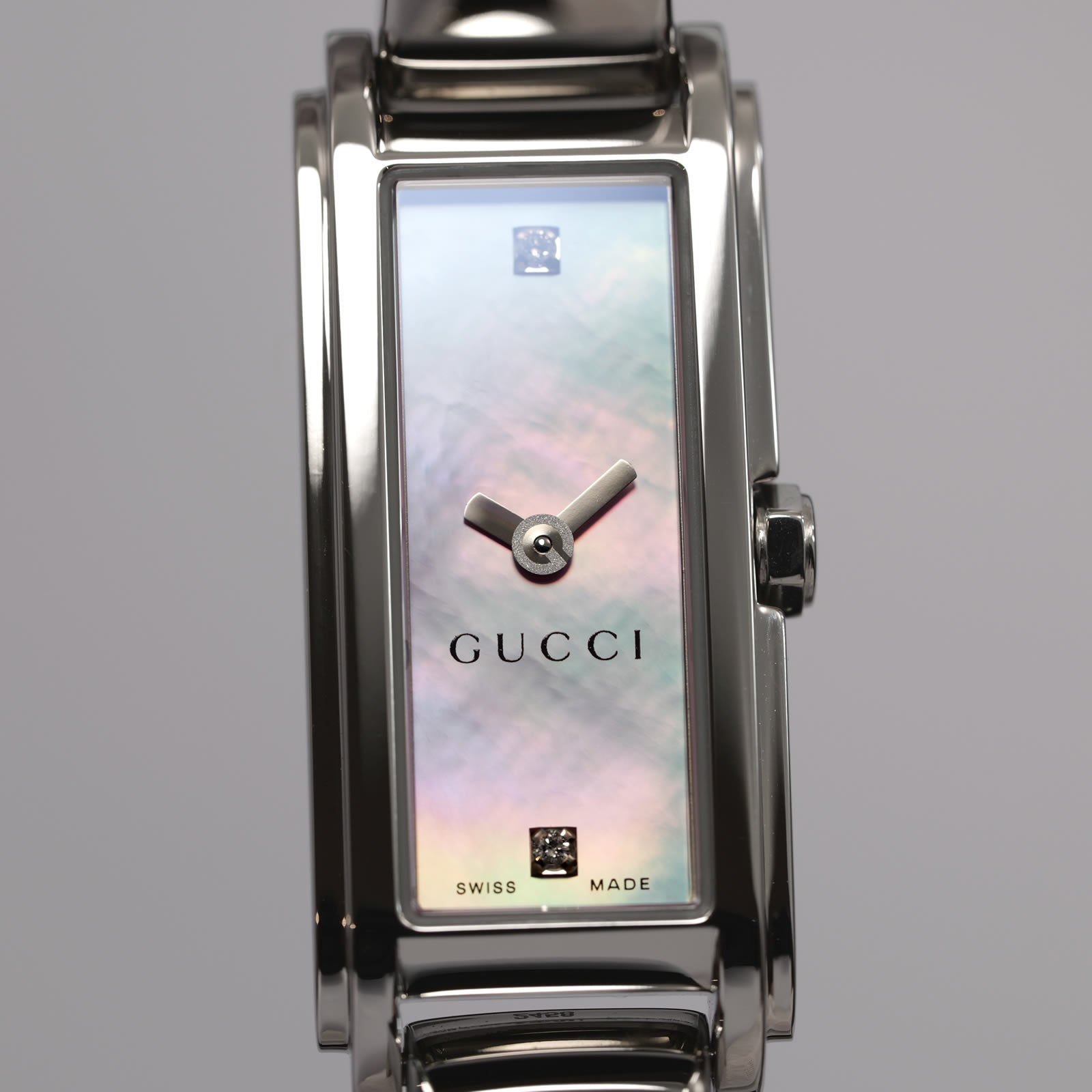 Gucci G-Line 109 Iridescent Pink Mother of Pearl rectangular dial close up