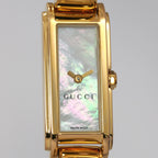 Gucci G-Line 109 White Mother of Pearl iridescent rectangular dial close up
