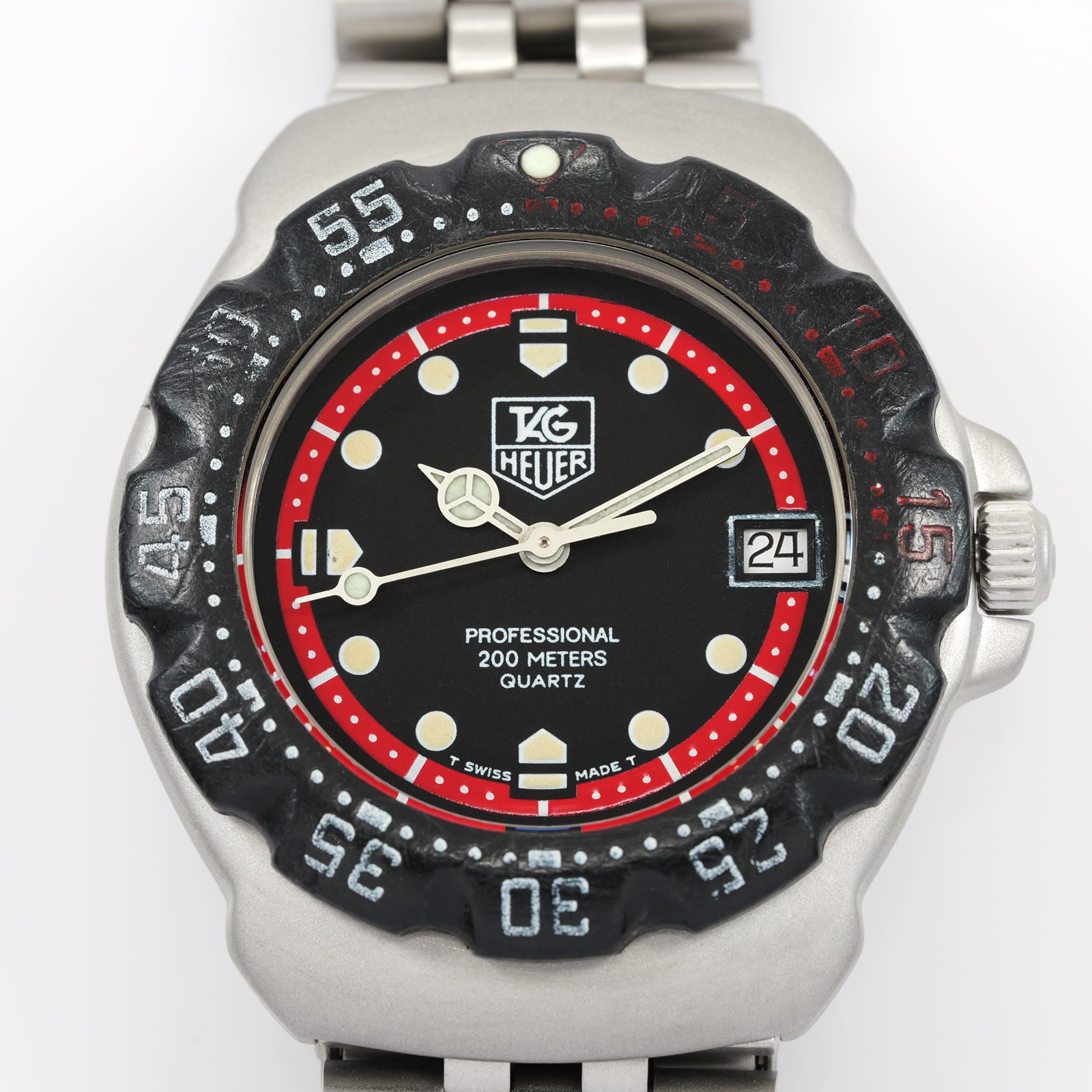 TAG Heuer Formula 1 WA1214 Black and Red dial close up