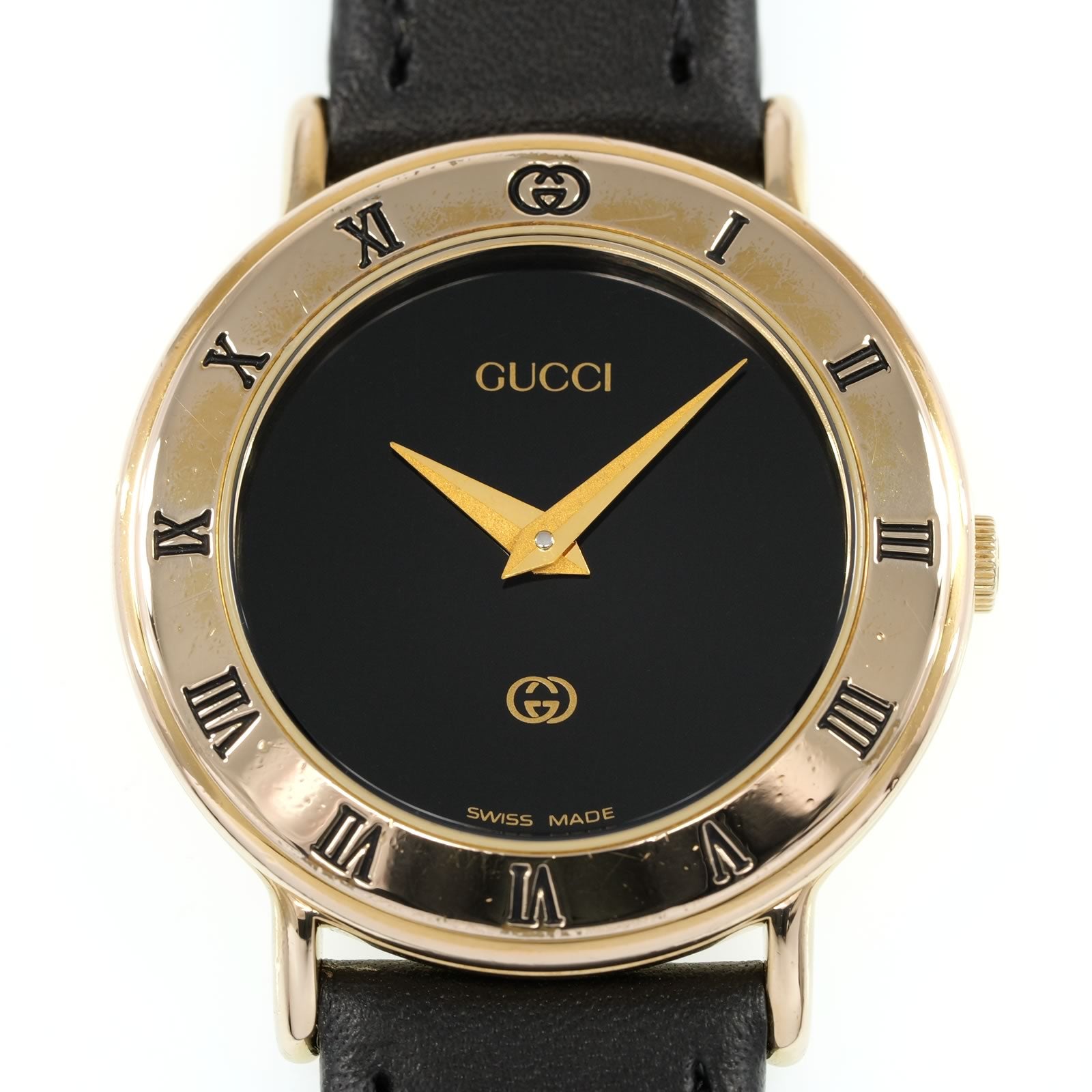 Gucci 3000L Black Dial Roman Numeral Bezel close up
