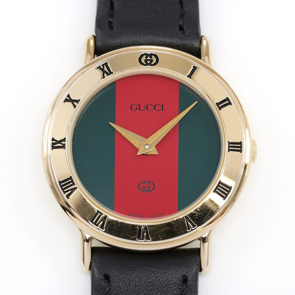 Gucci 3000L Red and Green Dial 18k Gold Plated Roman Numeral Bezel close up