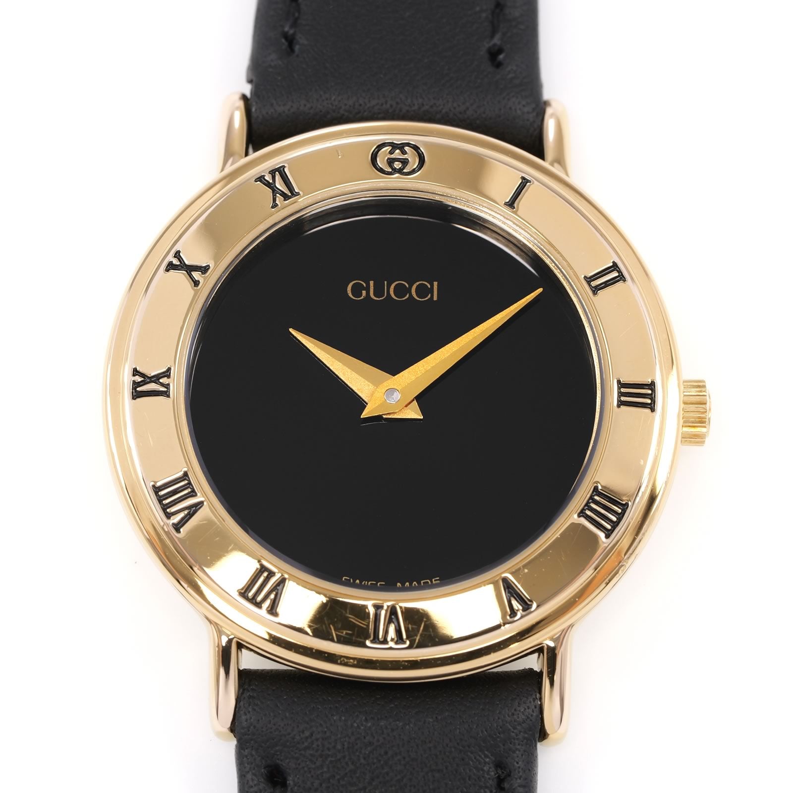 Gucci 3000L Black Dial 18k Gold Plated Roman Numeral bezel close up