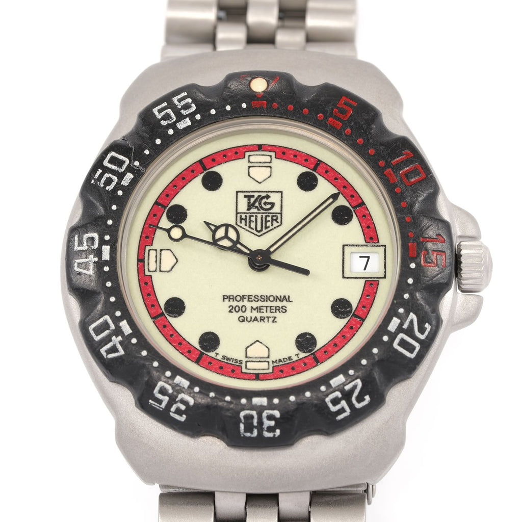 TAG Heuer Formula 1 Men's 35mm Luminous Dial WA1211 close up with red accents