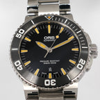 Oris Aquis 7653 Black Dial orange accents close up