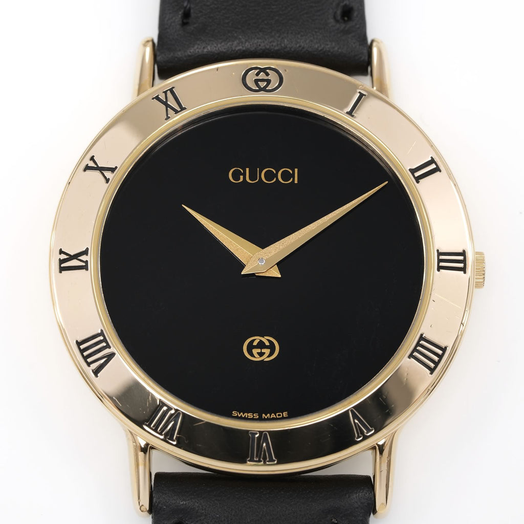 Gucci 3000M Black Dial 18k Gold Plated Roman Numeral Bezel close up