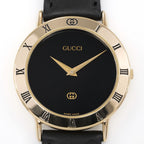 Gucci 3000M Black Dial 18k Gold Plated Roman Numeral Bezel close up