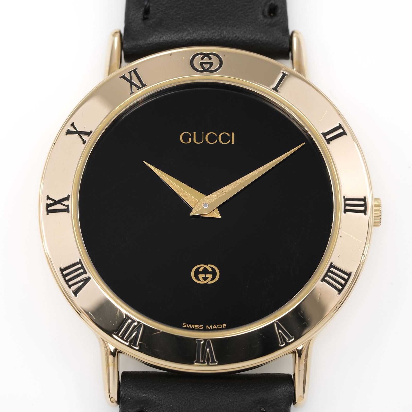 Gucci 3000M Black Dial 18k Gold Plated Roman Numeral Bezel close up