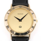 Gucci 3000M Champagne Dial close up with Roman Numeral bezel