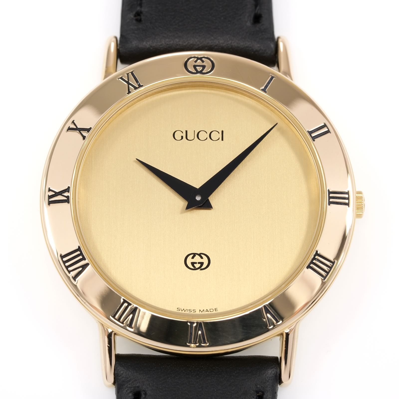 Gucci 3000M Champagne Dial close up with Roman Numeral bezel