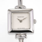 Gucci 1900L Square brushed silver dial close up