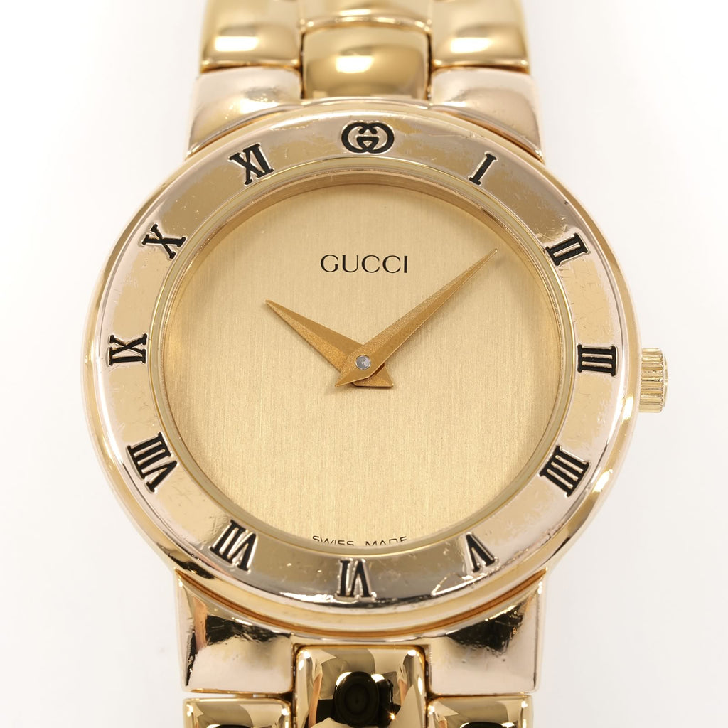 Gucci 3300L Champagne Dial 18k Gold Plated Roman Numeral bezel close up