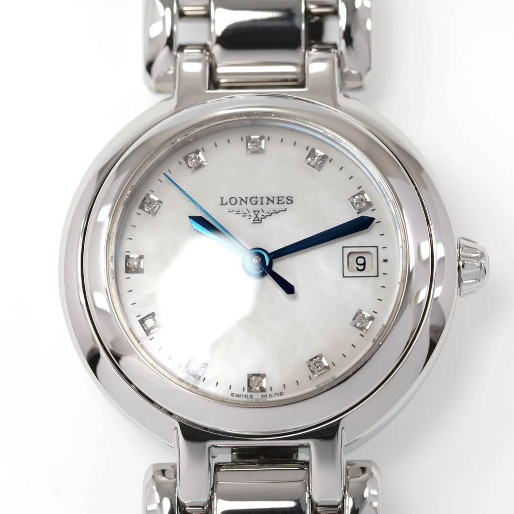 Longines PrimaLuna L8.110.4 White Mother of Pearl dial with diamond markers close up