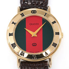Gucci 3000L Red and Green Dial close up with 18k Gold Plated Roman Numeral Bezel