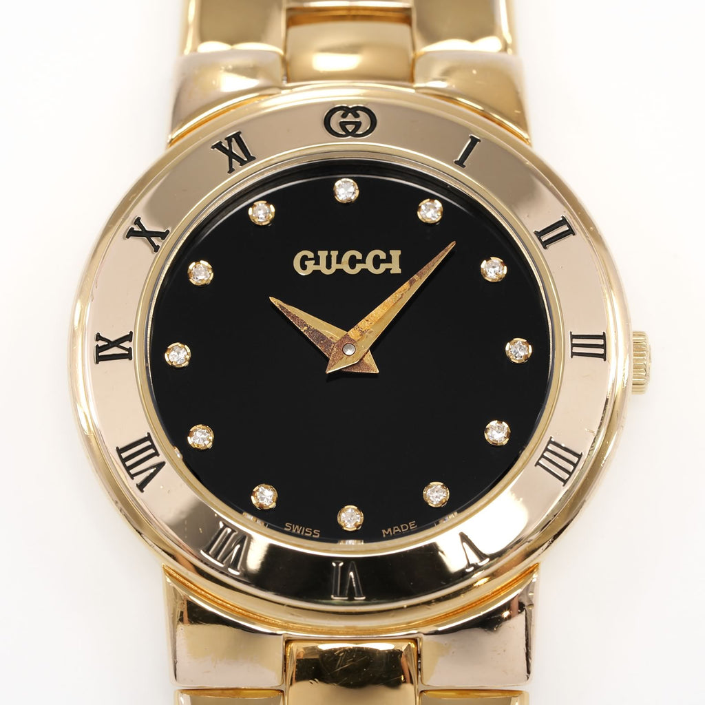 Gucci 3300L Black Dial with diamond markers and roman numeral bezel close up
